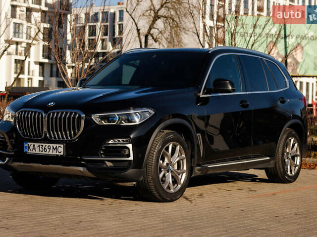 Чорний БМВ Х5, об'ємом двигуна 3 л та пробігом 183 тис. км за 58800 $, фото 1 на Automoto.ua