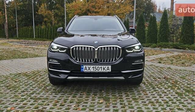 Чорний БМВ Х5, об'ємом двигуна 2 л та пробігом 73 тис. км за 53700 $, фото 1 на Automoto.ua