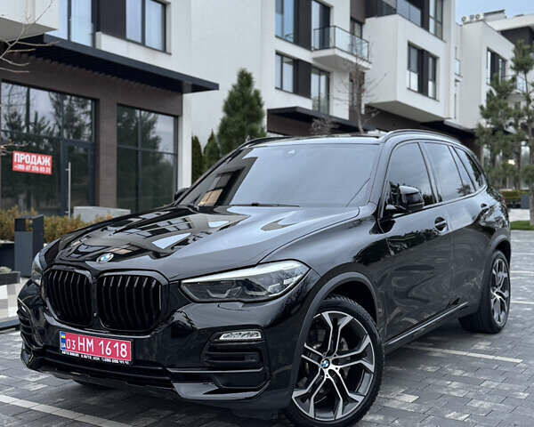 Чорний БМВ Х5, об'ємом двигуна 3 л та пробігом 147 тис. км за 41500 $, фото 1 на Automoto.ua