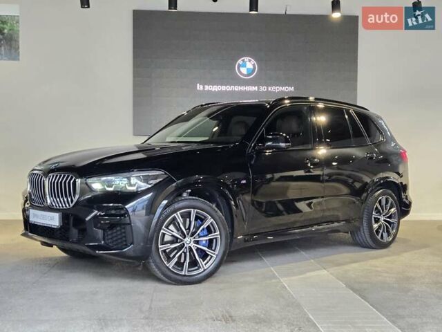 Черный БМВ Х5, объемом двигателя 3 л и пробегом 90 тыс. км за 65999 $, фото 1 на Automoto.ua