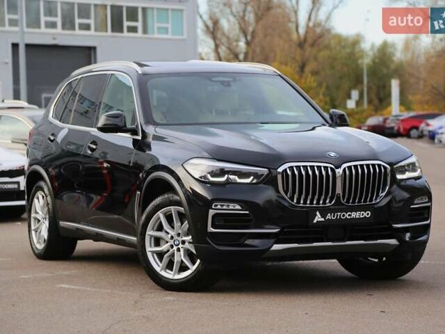 Черный БМВ Х5, объемом двигателя 3 л и пробегом 174 тыс. км за 49500 $, фото 1 на Automoto.ua