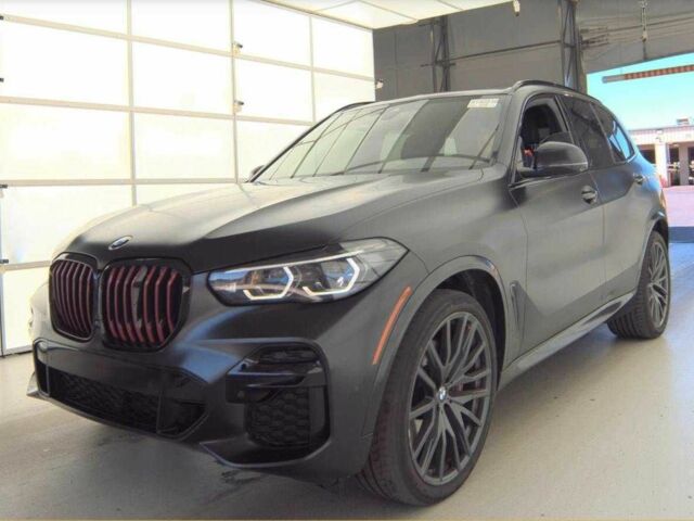 Черный БМВ Х5, объемом двигателя 3 л и пробегом 54 тыс. км за 53800 $, фото 1 на Automoto.ua