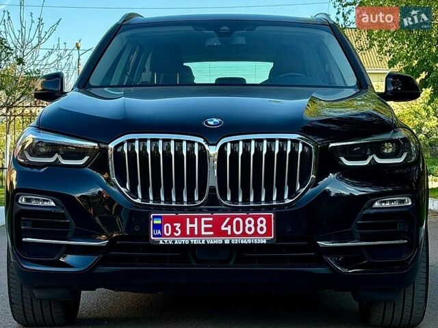 Черный БМВ Х5, объемом двигателя 3 л и пробегом 160 тыс. км за 48900 $, фото 1 на Automoto.ua