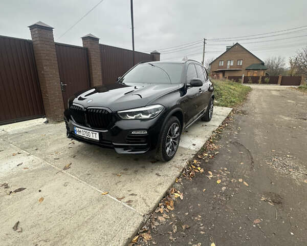 Черный БМВ Х5, объемом двигателя 2 л и пробегом 106 тыс. км за 59999 $, фото 1 на Automoto.ua