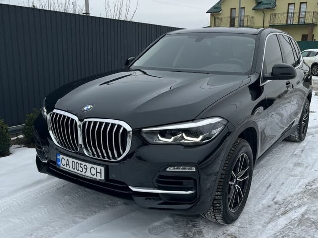 Чорний БМВ Х5, об'ємом двигуна 2 л та пробігом 78 тис. км за 56000 $, фото 1 на Automoto.ua