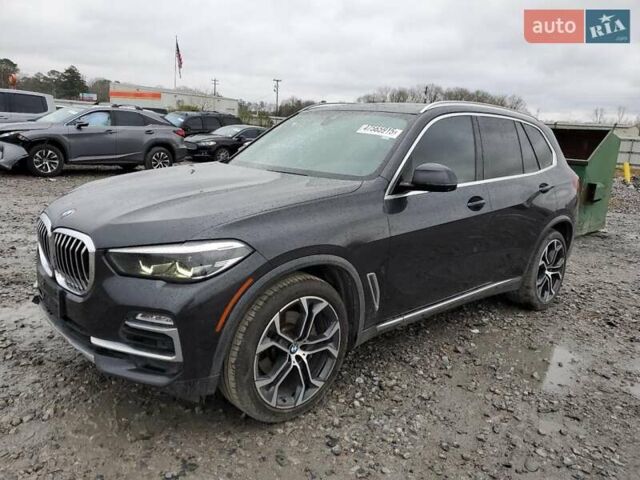 Черный БМВ Х5, объемом двигателя 3 л и пробегом 142 тыс. км за 25000 $, фото 1 на Automoto.ua