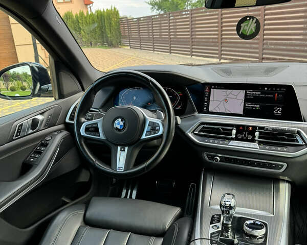 Черный БМВ Х5, объемом двигателя 3 л и пробегом 57 тыс. км за 75000 $, фото 1 на Automoto.ua