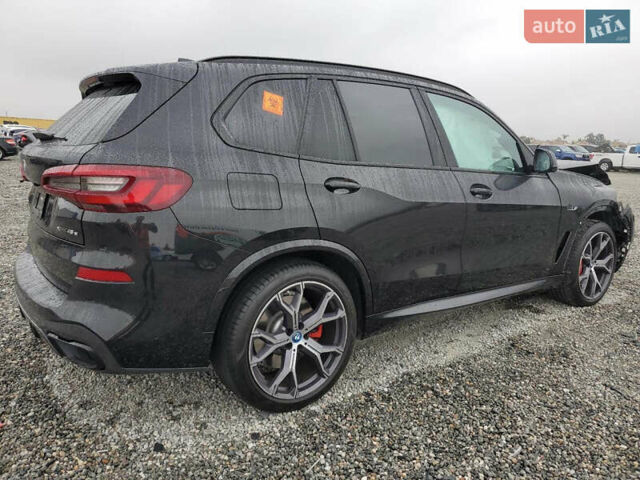Черный БМВ Х5, объемом двигателя 3 л и пробегом 34 тыс. км за 53800 $, фото 1 на Automoto.ua
