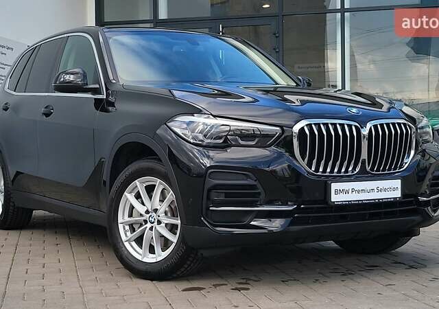 Черный БМВ Х5, объемом двигателя 2 л и пробегом 87 тыс. км за 55900 $, фото 1 на Automoto.ua