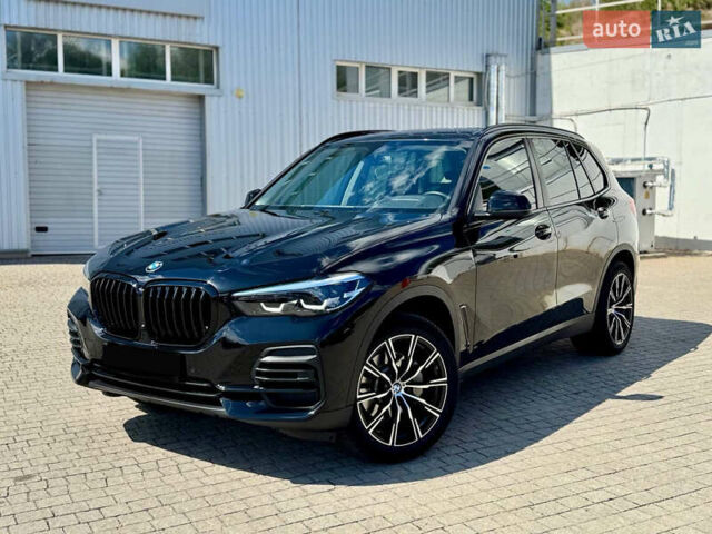 Черный БМВ Х5, объемом двигателя 2 л и пробегом 52 тыс. км за 61000 $, фото 1 на Automoto.ua