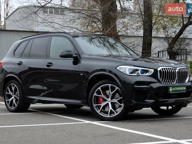 Черный БМВ Х5, объемом двигателя 3 л и пробегом 55 тыс. км за 72999 $, фото 1 на Automoto.ua