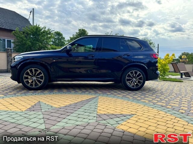 Черный БМВ Х5, объемом двигателя 3 л и пробегом 57 тыс. км за 75000 $, фото 1 на Automoto.ua