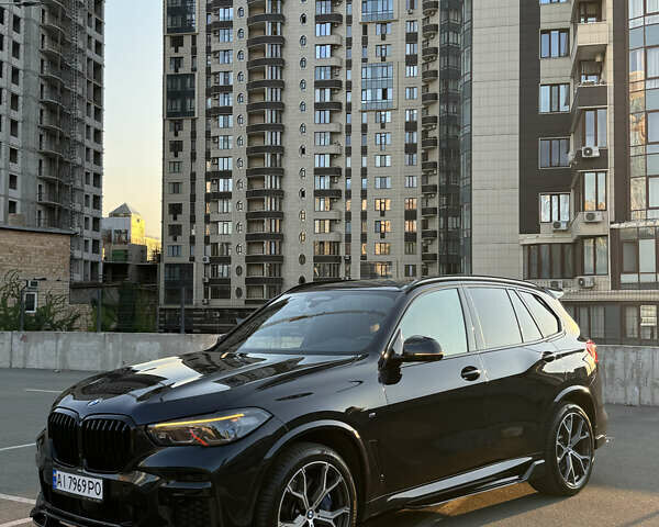 Черный БМВ Х5, объемом двигателя 3 л и пробегом 47 тыс. км за 89000 $, фото 1 на Automoto.ua