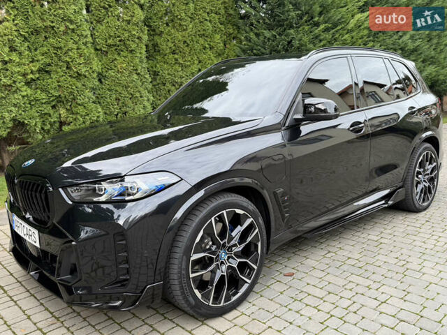 Черный БМВ Х5, объемом двигателя 3 л и пробегом 12 тыс. км за 88000 $, фото 1 на Automoto.ua