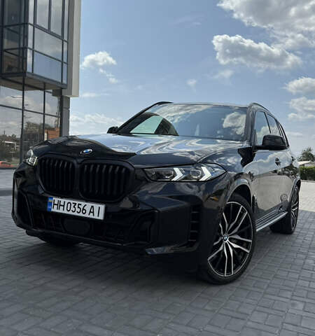Черный БМВ Х5, объемом двигателя 3 л и пробегом 20 тыс. км за 80500 $, фото 1 на Automoto.ua