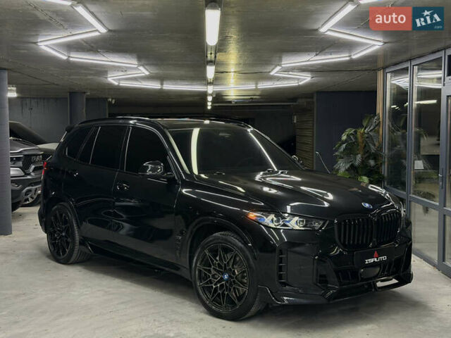 Черный БМВ Х5, объемом двигателя 3 л и пробегом 35 тыс. км за 72000 $, фото 1 на Automoto.ua
