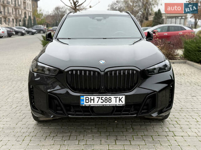 Черный БМВ Х5, объемом двигателя 2.99 л и пробегом 64 тыс. км за 105000 $, фото 1 на Automoto.ua