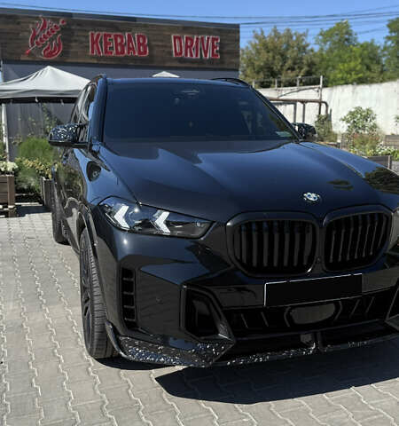 Черный БМВ Х5, объемом двигателя 3 л и пробегом 30 тыс. км за 87999 $, фото 1 на Automoto.ua