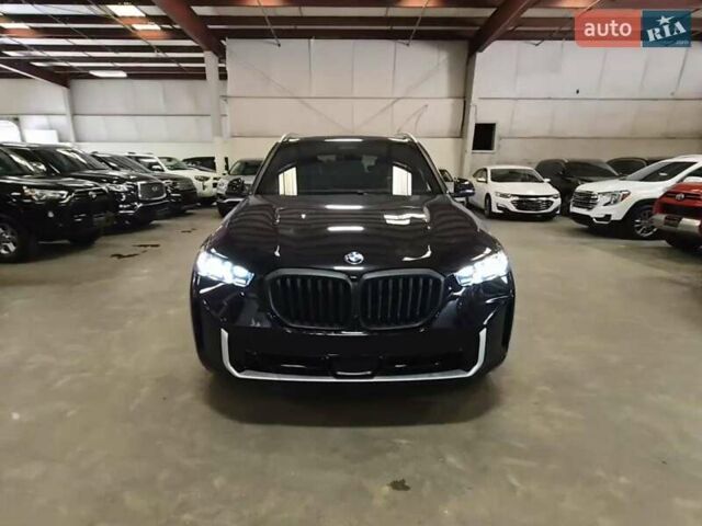 Черный БМВ Х5, объемом двигателя 3 л и пробегом 50 тыс. км за 42000 $, фото 1 на Automoto.ua