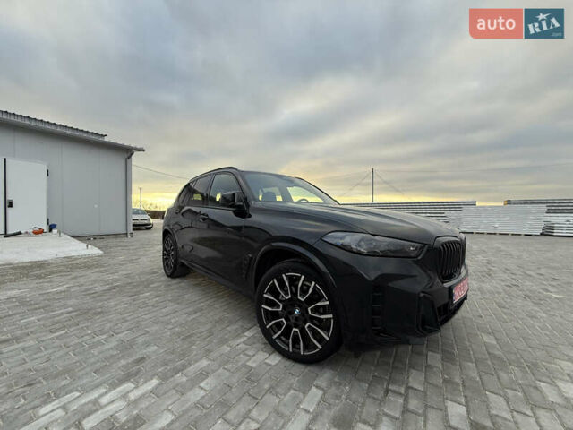 Чорний БМВ Х5, об'ємом двигуна 3 л та пробігом 39 тис. км за 76000 $, фото 1 на Automoto.ua