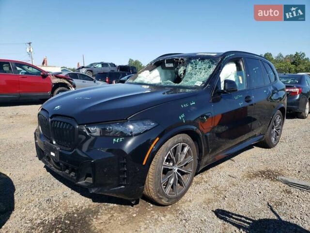 Черный БМВ Х5, объемом двигателя 3 л и пробегом 10 тыс. км за 82500 $, фото 1 на Automoto.ua