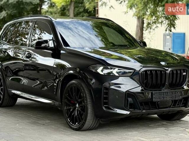 Черный БМВ Х5, объемом двигателя 4.4 л и пробегом 21 тыс. км за 123000 $, фото 1 на Automoto.ua