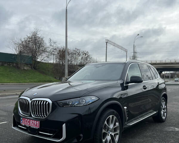 Черный БМВ Х5, объемом двигателя 3 л и пробегом 41 тыс. км за 92500 $, фото 1 на Automoto.ua