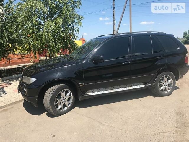 Чорний БМВ Х5, об'ємом двигуна 3 л та пробігом 300 тис. км за 16000 $, фото 1 на Automoto.ua