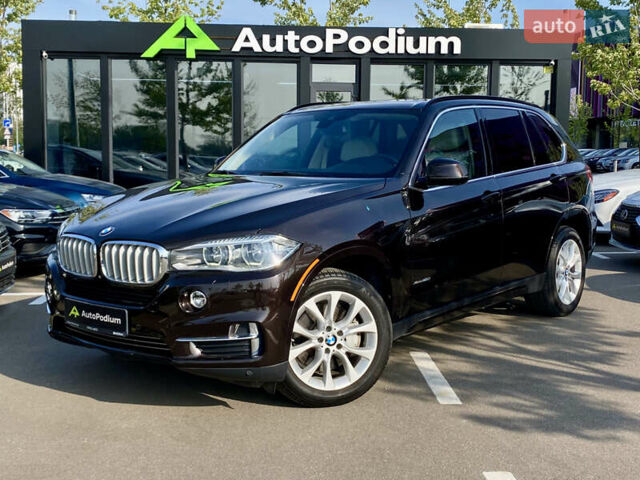 Коричневий БМВ Х5, об'ємом двигуна 4.4 л та пробігом 70 тис. км за 28100 $, фото 1 на Automoto.ua