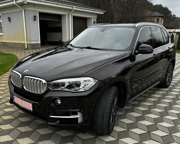 Коричневый БМВ Х5, объемом двигателя 2.99 л и пробегом 261 тыс. км за 27700 $, фото 1 на Automoto.ua