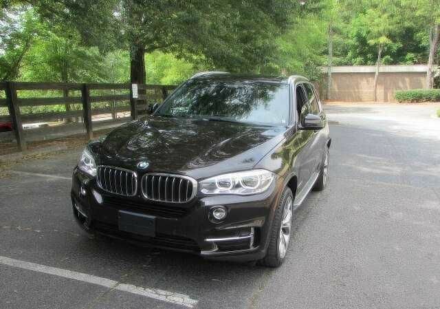 Коричневый БМВ Х5, объемом двигателя 3 л и пробегом 88 тыс. км за 30000 $, фото 1 на Automoto.ua