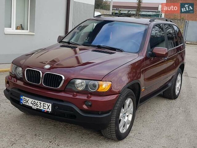 Красный БМВ Х5, объемом двигателя 2.93 л и пробегом 395 тыс. км за 7750 $, фото 1 на Automoto.ua