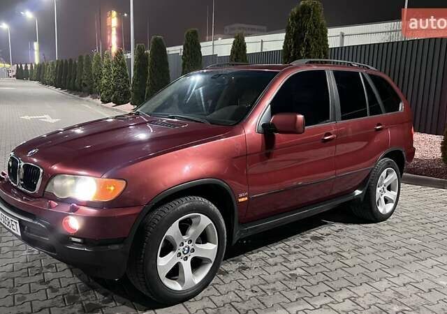 Красный БМВ Х5, объемом двигателя 3 л и пробегом 340 тыс. км за 6500 $, фото 1 на Automoto.ua