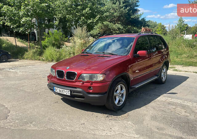 Красный БМВ Х5, объемом двигателя 3 л и пробегом 331 тыс. км за 8100 $, фото 1 на Automoto.ua