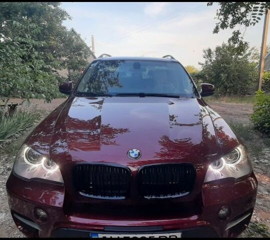 Красный БМВ Х5, объемом двигателя 3 л и пробегом 213 тыс. км за 20900 $, фото 1 на Automoto.ua