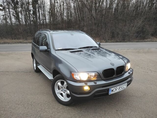 Серый БМВ Х5, объемом двигателя 3 л и пробегом 300 тыс. км за 5900 $, фото 1 на Automoto.ua