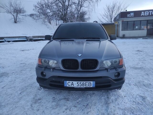 Серый БМВ Х5, объемом двигателя 3 л и пробегом 230 тыс. км за 5900 $, фото 1 на Automoto.ua