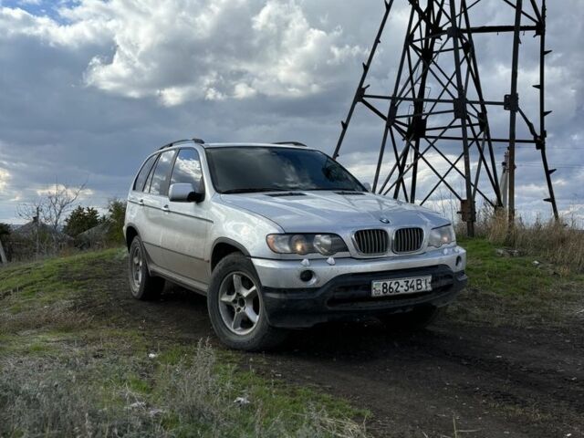 Серый БМВ Х5, объемом двигателя 3 л и пробегом 200 тыс. км за 4600 $, фото 1 на Automoto.ua