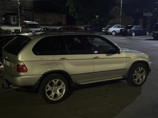 Серый БМВ Х5, объемом двигателя 3 л и пробегом 300 тыс. км за 5800 $, фото 1 на Automoto.ua