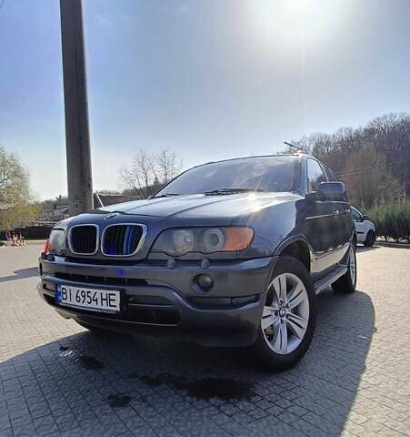 Серый БМВ Х5, объемом двигателя 3 л и пробегом 432 тыс. км за 8500 $, фото 1 на Automoto.ua