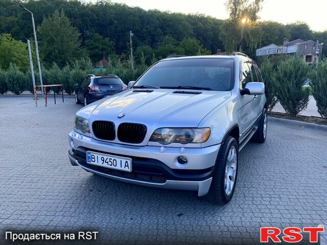 Серый БМВ Х5, объемом двигателя 3 л и пробегом 380 тыс. км за 8500 $, фото 1 на Automoto.ua