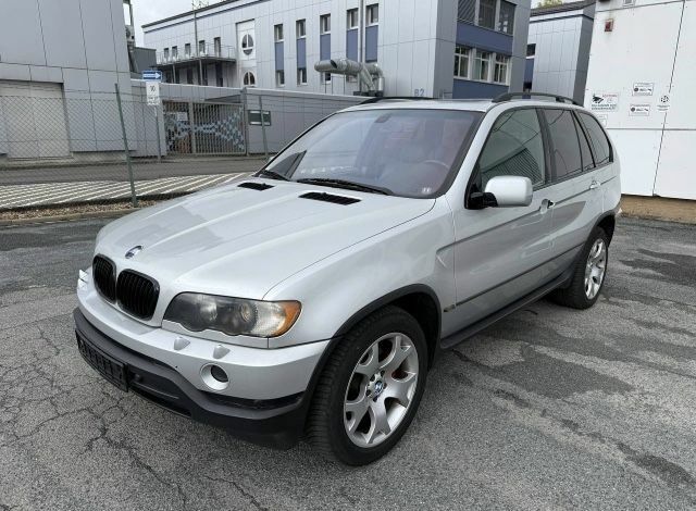 Серый БМВ Х5, объемом двигателя 3 л и пробегом 330 тыс. км за 4999 $, фото 1 на Automoto.ua