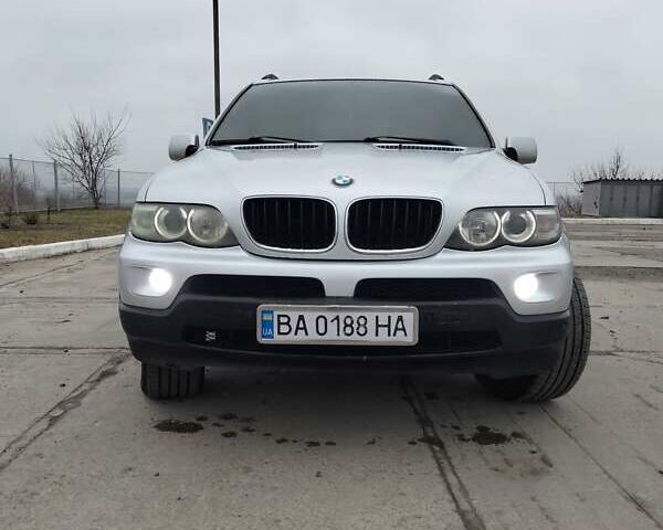 Серый БМВ Х5, объемом двигателя 3 л и пробегом 400 тыс. км за 9000 $, фото 1 на Automoto.ua