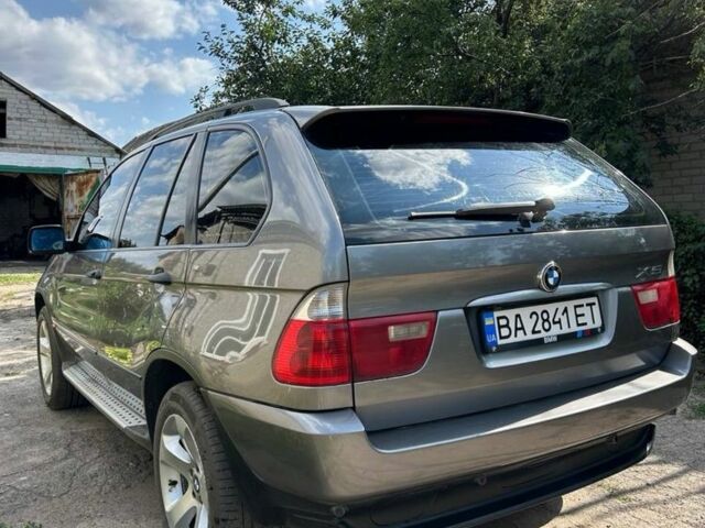 Серый БМВ Х5, объемом двигателя 3 л и пробегом 419 тыс. км за 9500 $, фото 1 на Automoto.ua