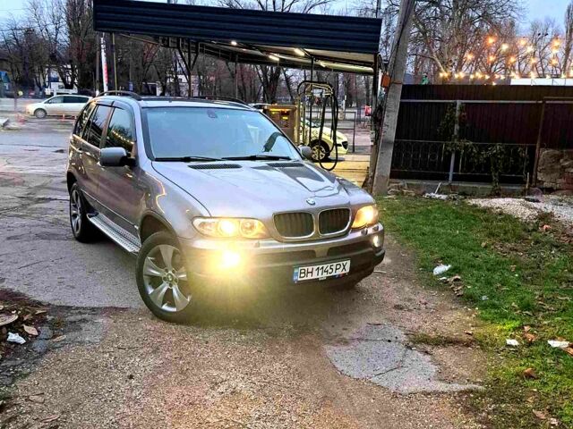 Серый БМВ Х5, объемом двигателя 3 л и пробегом 299 тыс. км за 11800 $, фото 1 на Automoto.ua