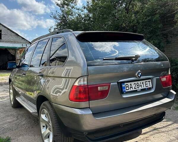 Серый БМВ Х5, объемом двигателя 3 л и пробегом 400 тыс. км за 11000 $, фото 1 на Automoto.ua