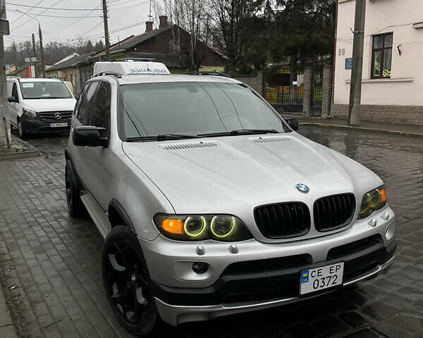 Серый БМВ Х5, объемом двигателя 3 л и пробегом 350 тыс. км за 12000 $, фото 1 на Automoto.ua