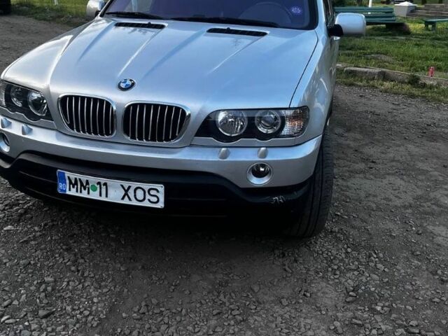 Серый БМВ Х5, объемом двигателя 3 л и пробегом 430 тыс. км за 5700 $, фото 1 на Automoto.ua