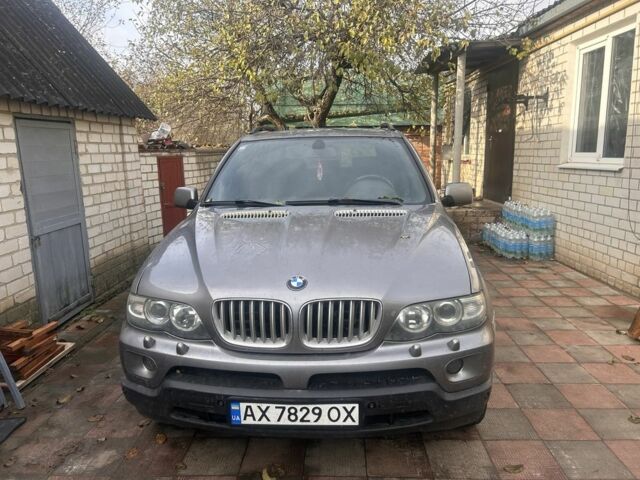 Серый БМВ Х5, объемом двигателя 3 л и пробегом 294 тыс. км за 6000 $, фото 1 на Automoto.ua