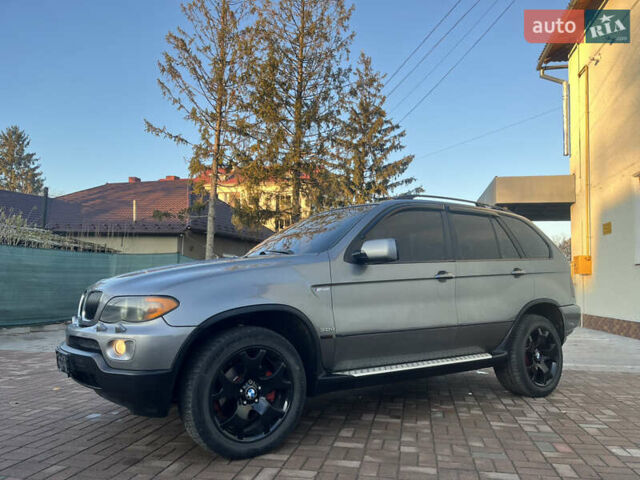 Сірий БМВ Х5, об'ємом двигуна 3 л та пробігом 293 тис. км за 11099 $, фото 1 на Automoto.ua